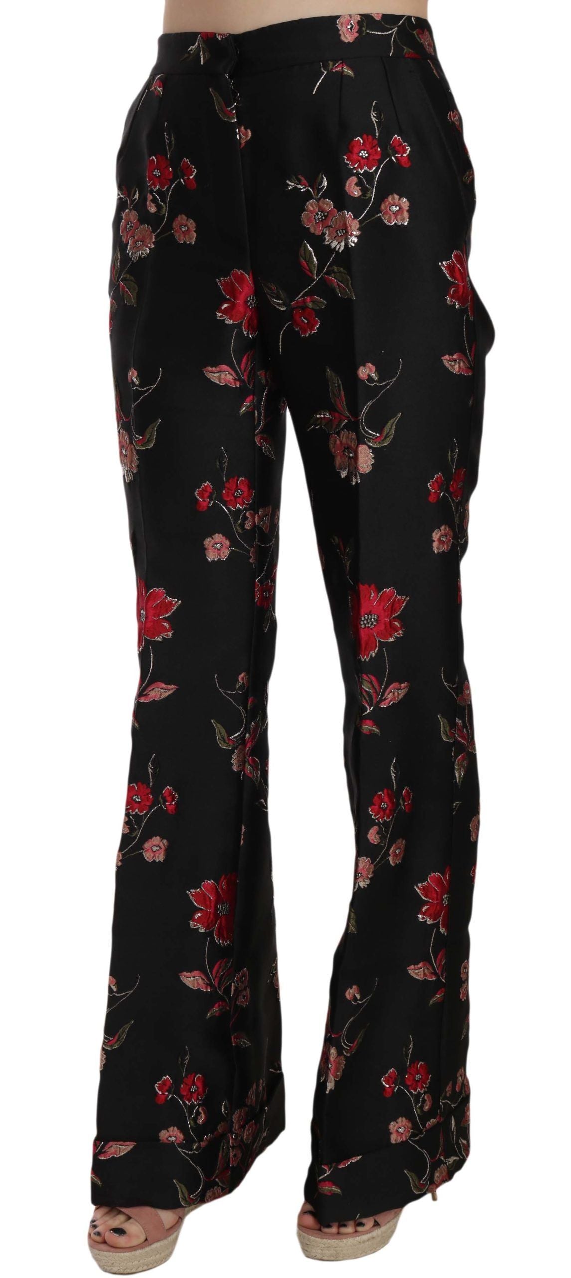 Black boot cut trouser pants with floral print by Dolce & Gabbana, showcasing tailored fit and stylish floral pattern.