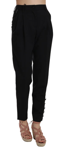 Black button-pleated tapered trouser pants by Dolce & Gabbana, featuring a tailored fit with pleats and button details.