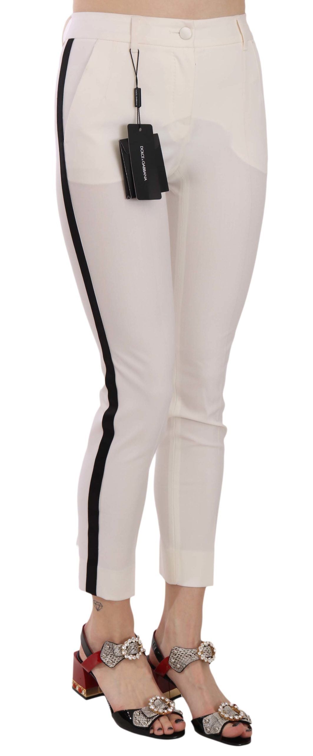 White cropped skinny pants with side stripe from Dolce & Gabbana, showcasing a fitted style and sleek design.