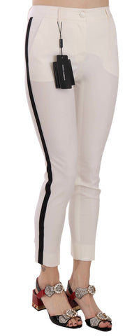 White cropped skinny pants with side stripe from Dolce & Gabbana, showcasing a fitted style and sleek design.