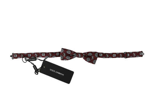 Men's Bordeaux maroon lion silk bow tie with adjustable neck strap by Dolce & Gabbana, featuring a detailed lion pattern.
