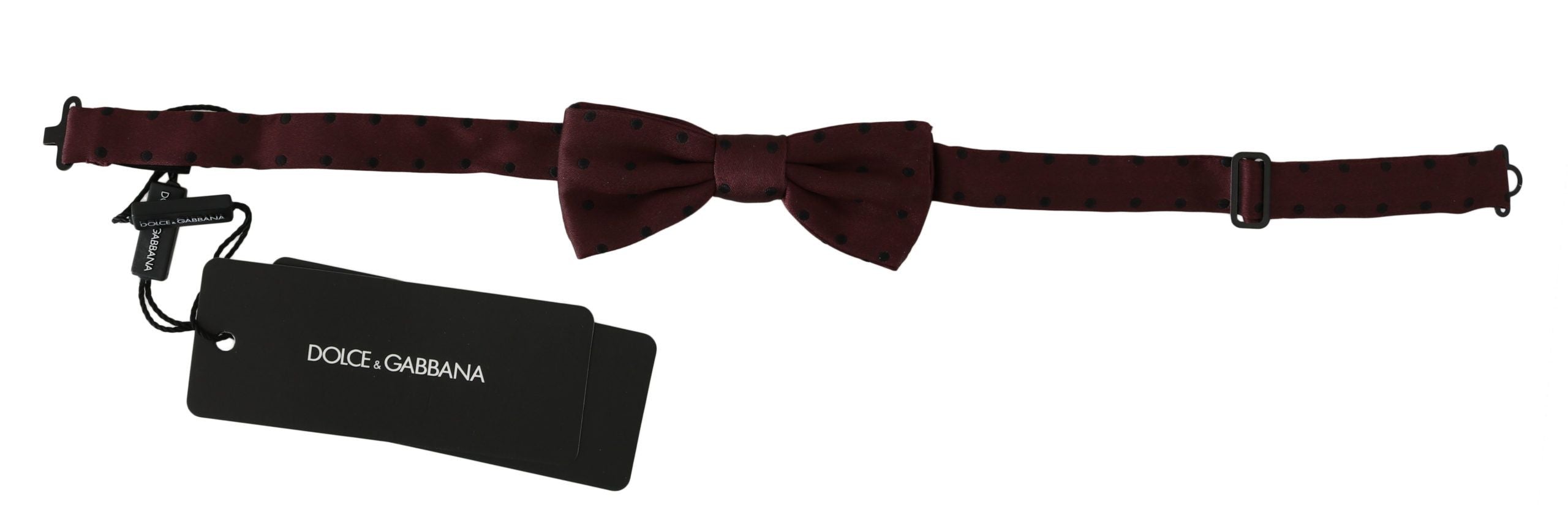 Purple dotted silk adjustable neck bow tie by Dolce & Gabbana, featuring a stylish papillon design.