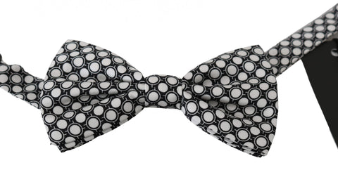 Men's black and white circles adjustable neck papillon bow tie by Dolce & Gabbana, featuring a stylish pattern and classic design.
