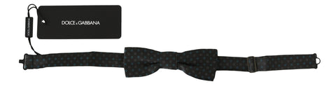 Men's gray silk bow tie with a pattern, adjustable neck strap, by Dolce & Gabbana, shown on a neutral background.