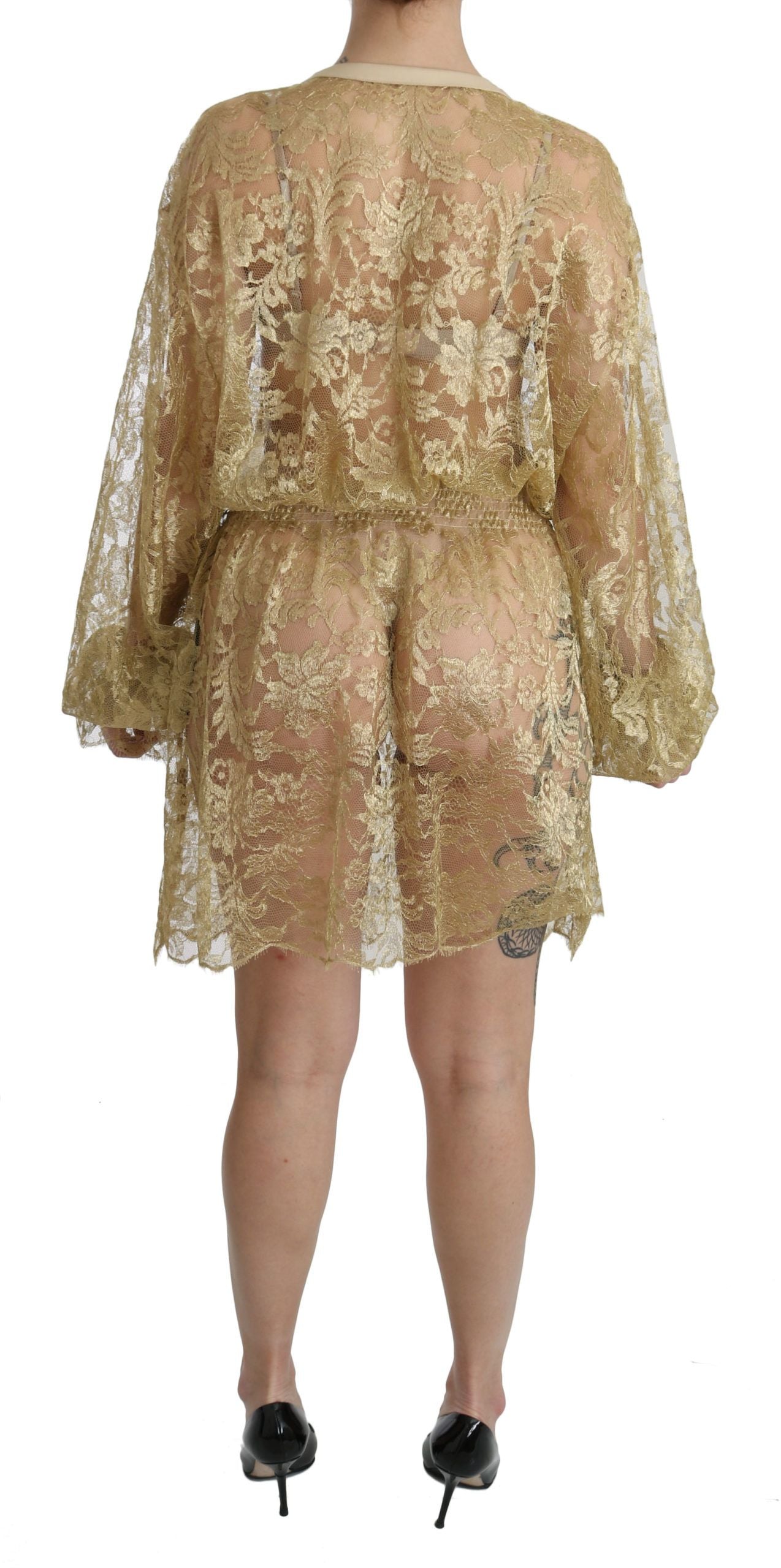 Gold lace see-through A-line knee-length dress by Dolce & Gabbana, featuring intricate lace details and a stylish silhouette.