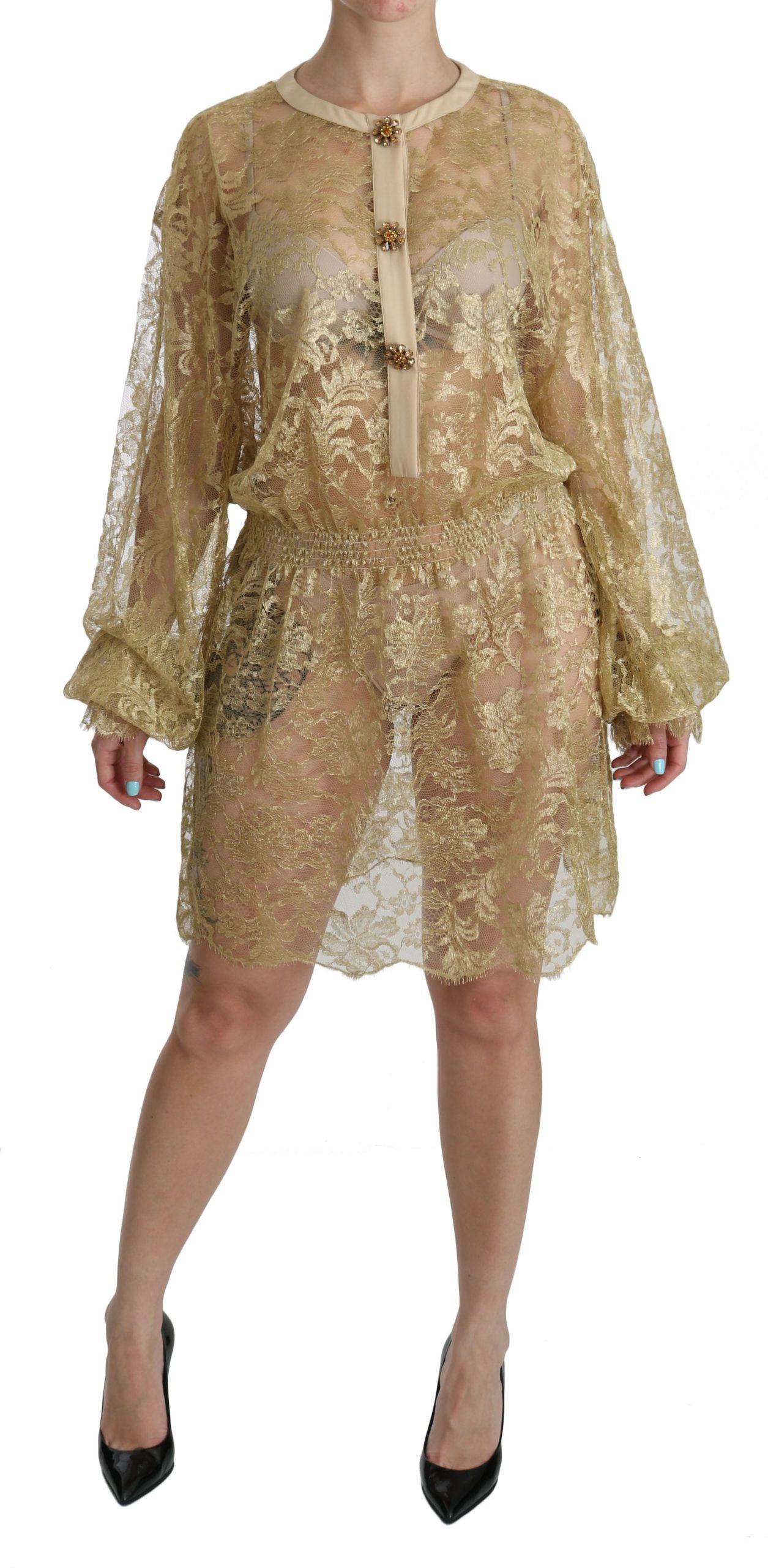 Gold lace see-through A-line knee-length dress by Dolce & Gabbana, featuring intricate lace details and elegant silhouette.