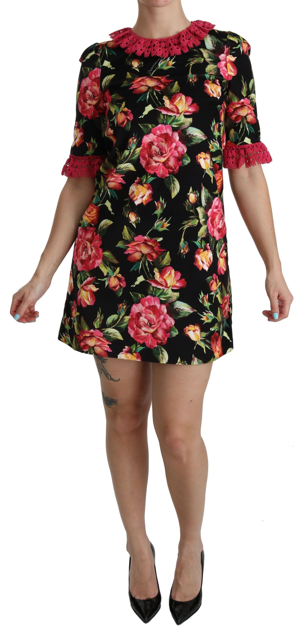Pink floral lace A-line shift mini dress by Dolce & Gabbana, featuring intricate lace details and a stylish, feminine silhouette.