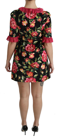 Pink floral lace Dolce & Gabbana A-line shift mini dress with a feminine lace design and elegant fit.