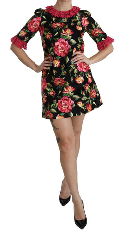 Pink floral lace A-line shift mini dress by Dolce & Gabbana featuring delicate lace details and a feminine silhouette.