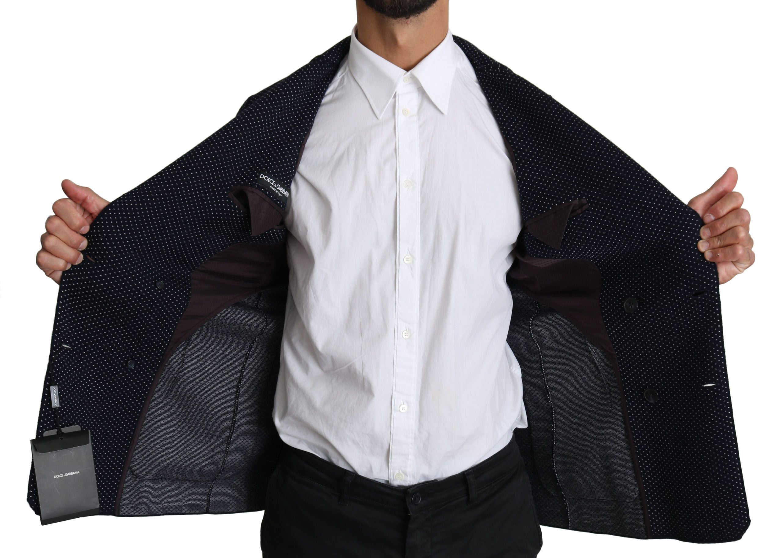 Dark blue dotted double-breasted coat blazer by Dolce & Gabbana, shown on a mannequin with front view and tailored fit.