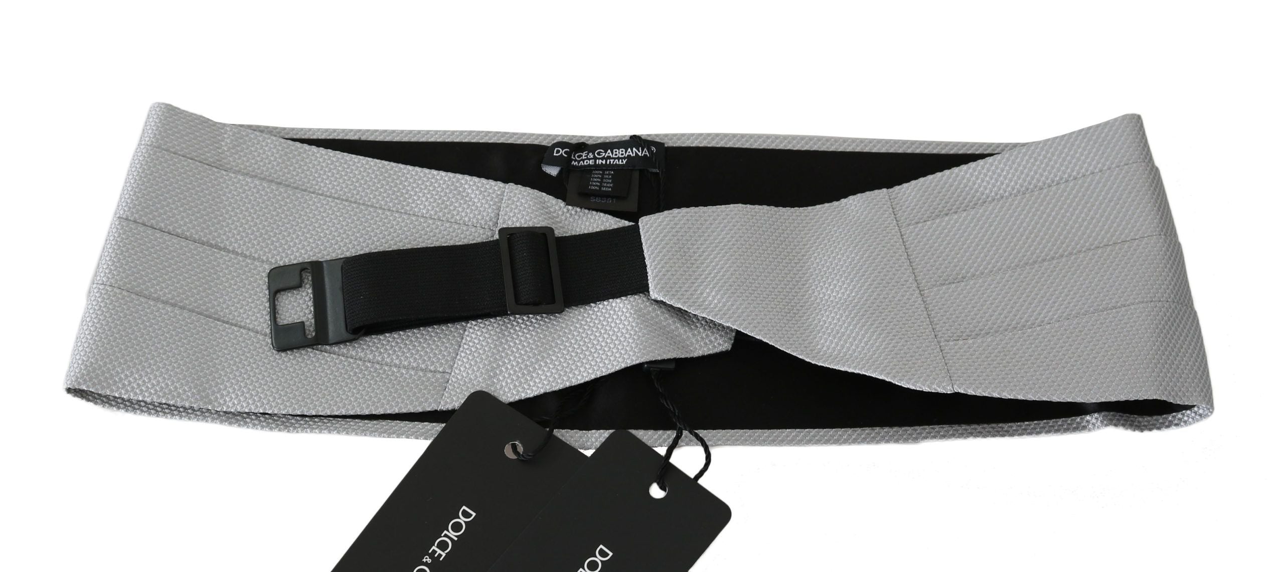 Gray men's silk waist belt or cummerbund with a sleek design, by Dolce & Gabbana, displayed flat on a neutral background.