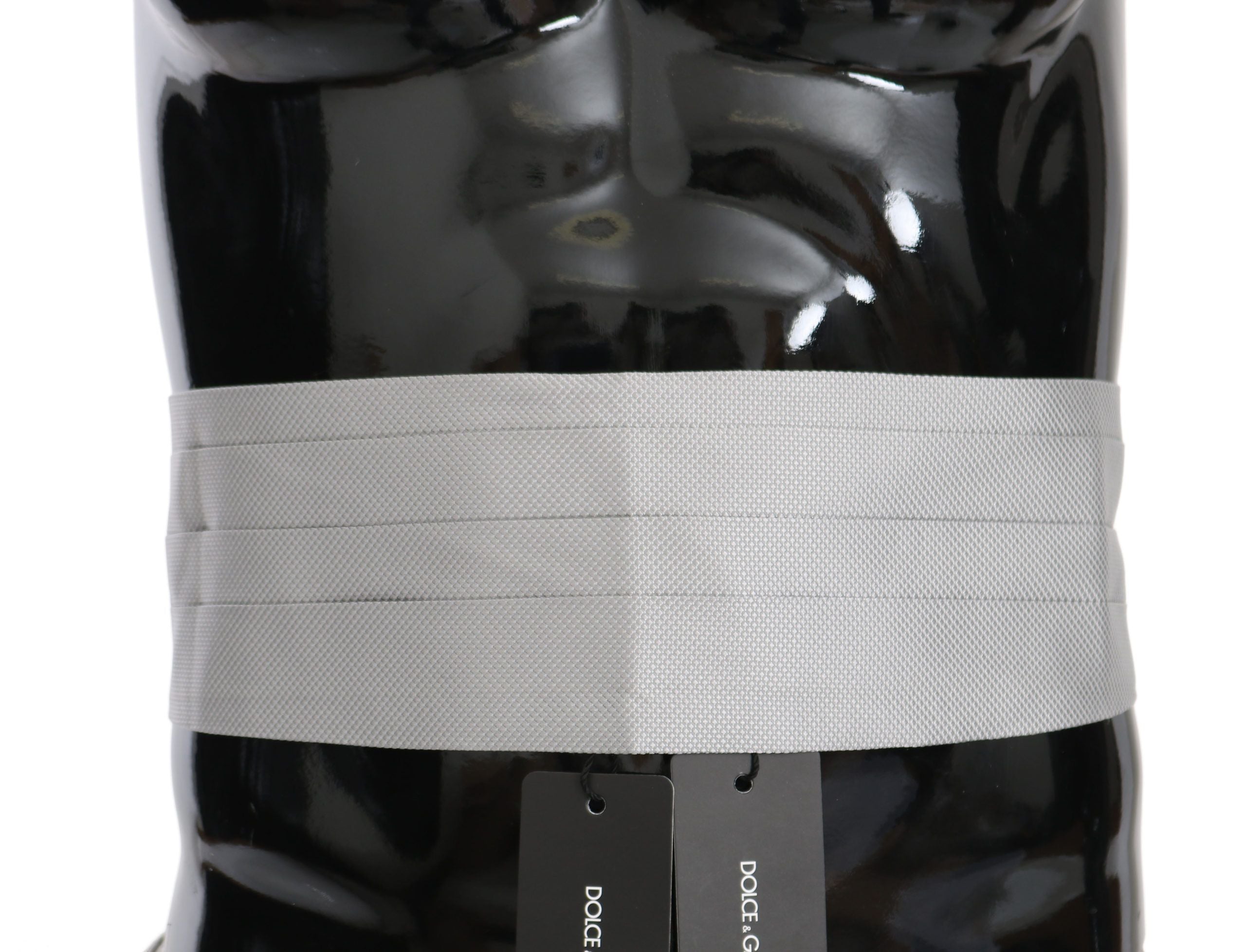 Gray men's silk waist belt or cummerbund with subtle texture, designed by Dolce & Gabbana.