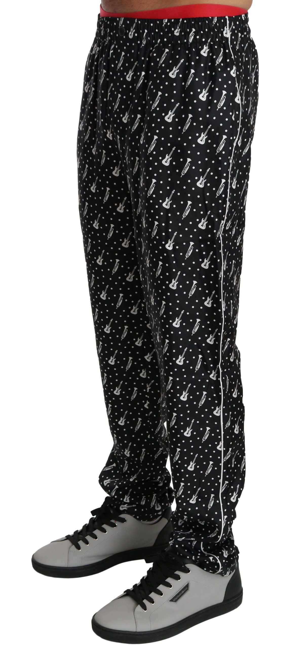 Black silk trouser pants for musical instrument performance by Dolce & Gabbana, featuring a sleek, tailored design.