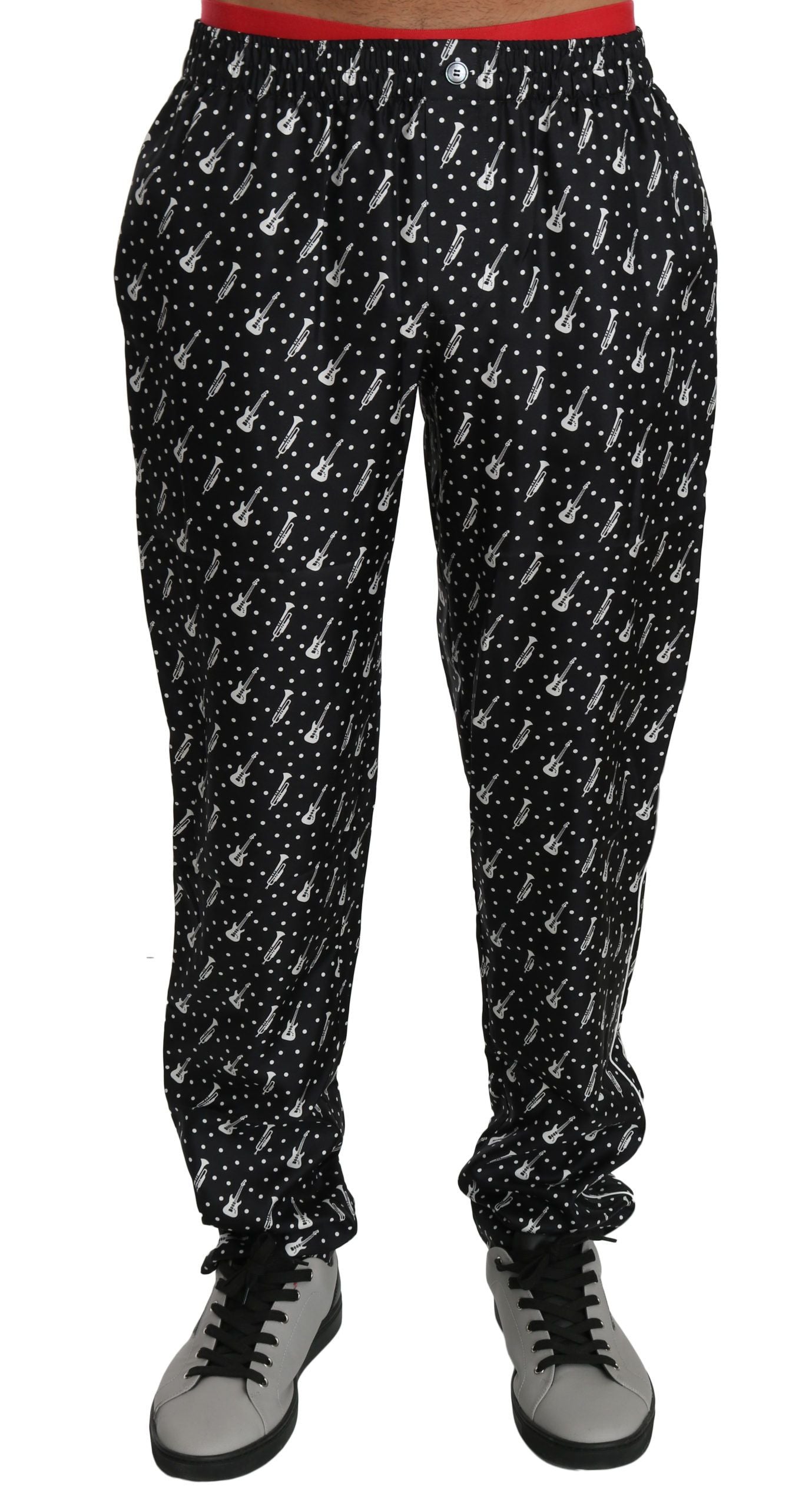 Silk black musical instrument trouser pants by Dolce & Gabbana, featuring a sleek design and tailored fit.
