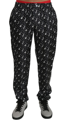 Silk black musical instrument trouser pants by Dolce & Gabbana, featuring a sleek design and tailored fit.