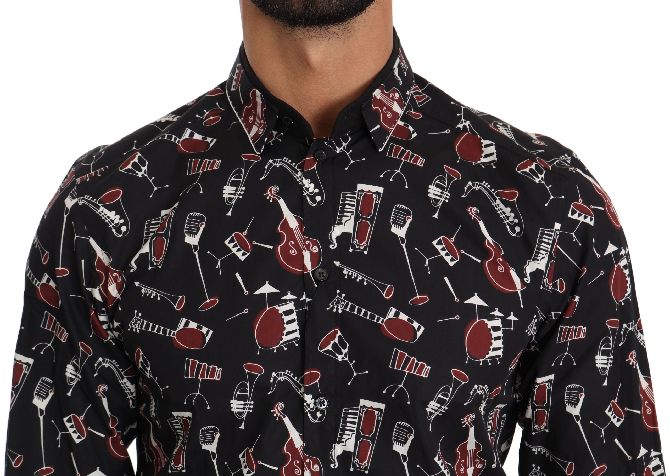 Black musical instrument slim fit shirt by Dolce & Gabbana, featuring a sleek design and tailored fit, displayed on a hanger.