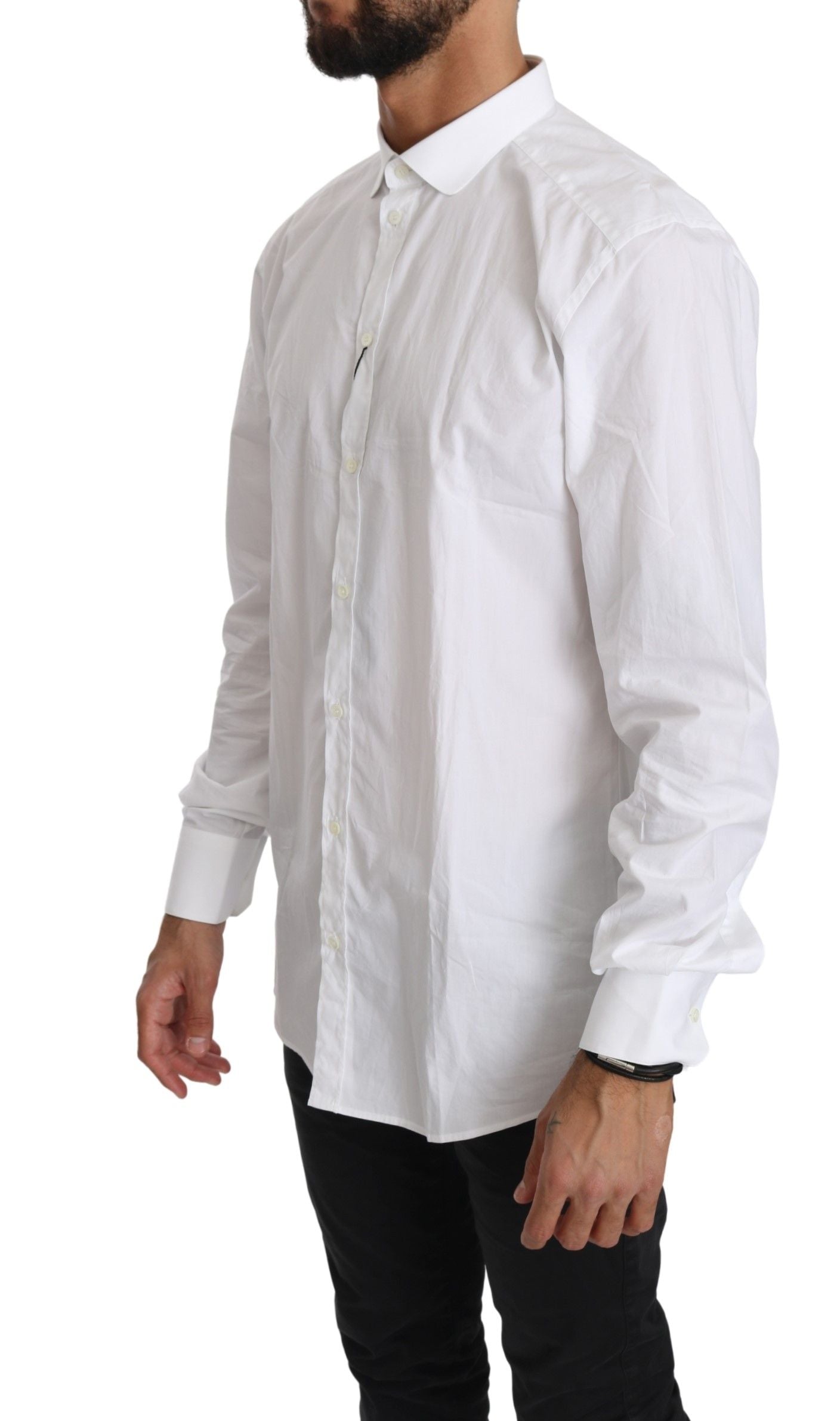 White cotton long sleeve top shirt by Dolce & Gabbana, shown on a hanger with detailed fabric texture.