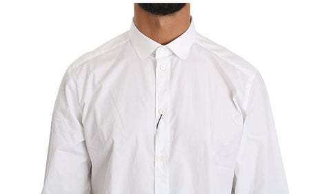 White cotton long sleeve shirt by Dolce & Gabbana, showing a classic fit with buttoned cuffs and a tailored collar.