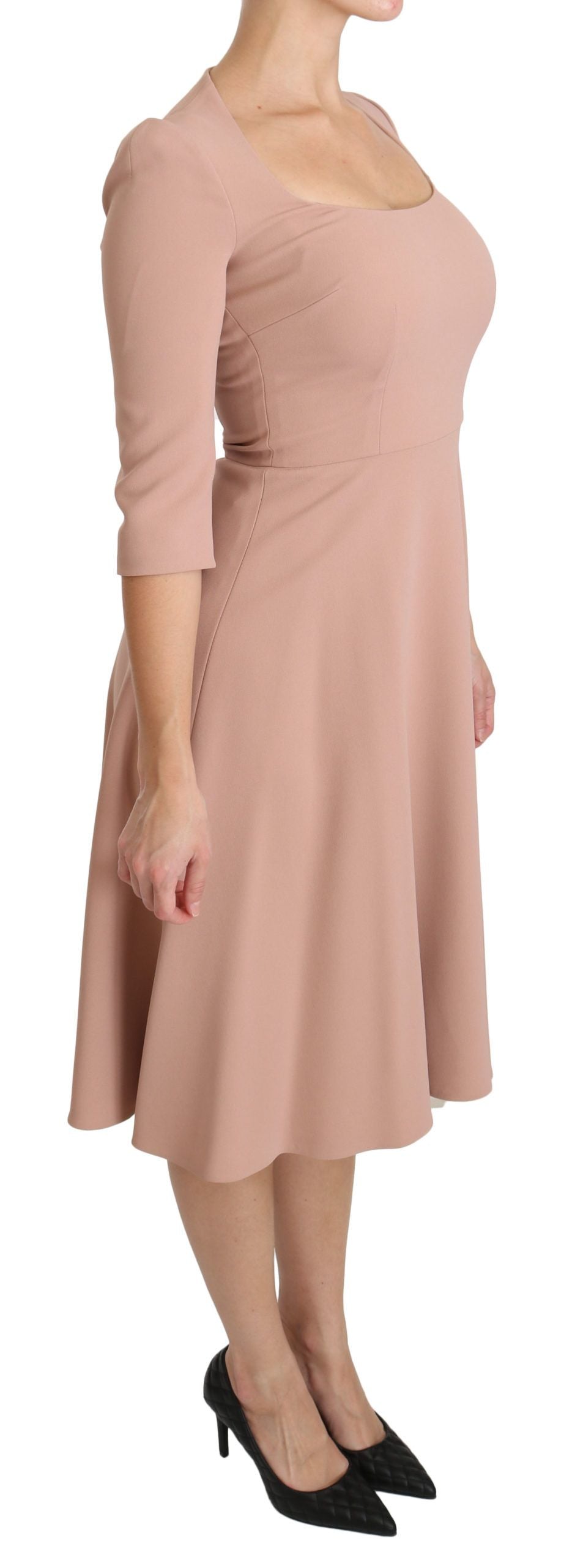 Pink Dolce & Gabbana 3/4 sleeve A-line viscose dress displayed on a mannequin with a V-neck design.