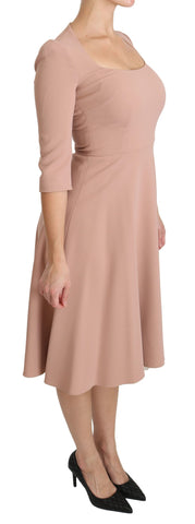 Pink Dolce & Gabbana 3/4 sleeve A-line viscose dress displayed on a mannequin with a V-neck design.
