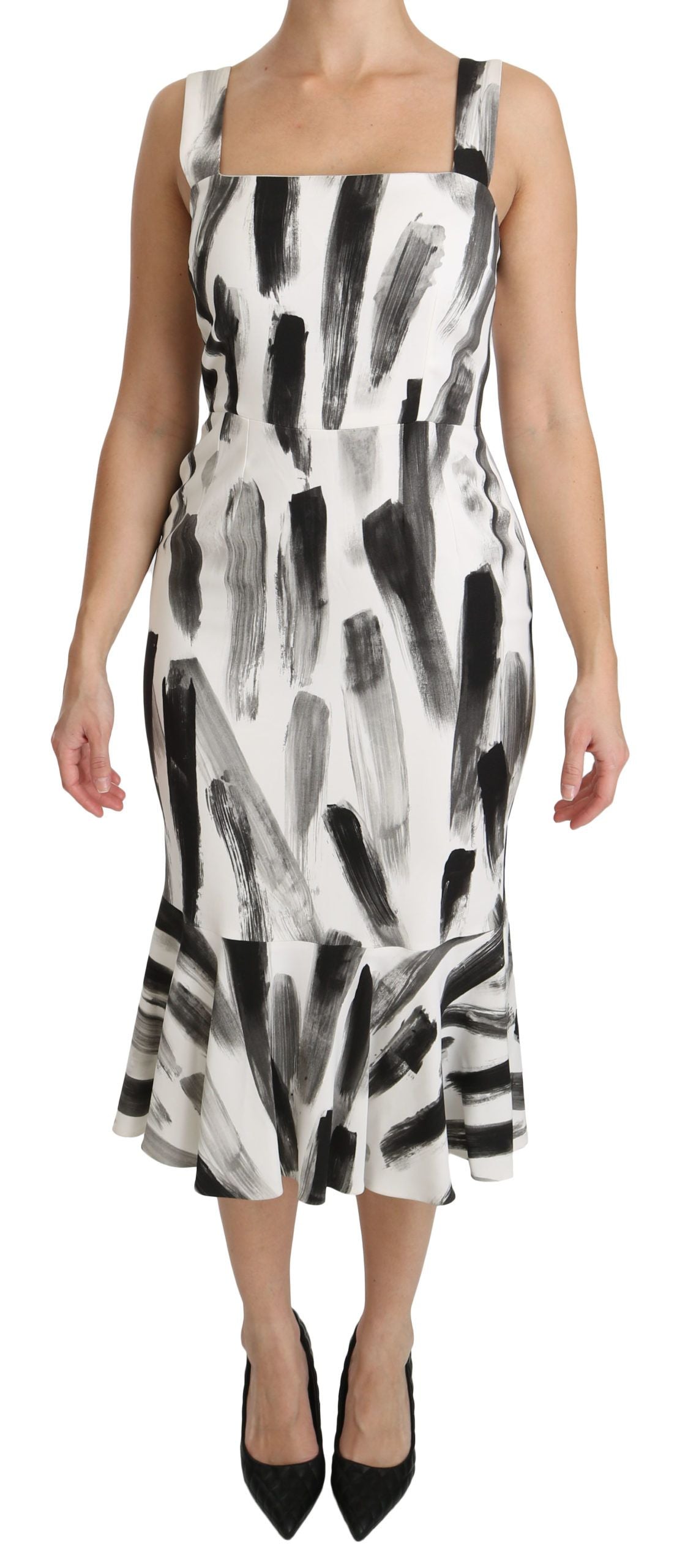 White and black printed sheath midi dress by Dolce & Gabbana, made of flowing viscose fabric with a fitted silhouette.