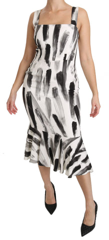 White and black printed sheath midi dress by Dolce & Gabbana, made of viscose, featuring a fitted silhouette and elegant design.