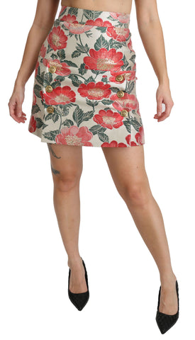 White, green, and red floral high-waist mini skirt by Dolce & Gabbana with a fitted design and vibrant pattern.