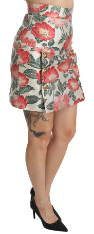 White, green, and red floral high waist mini skirt by Dolce & Gabbana with a fitted silhouette and vibrant floral pattern.