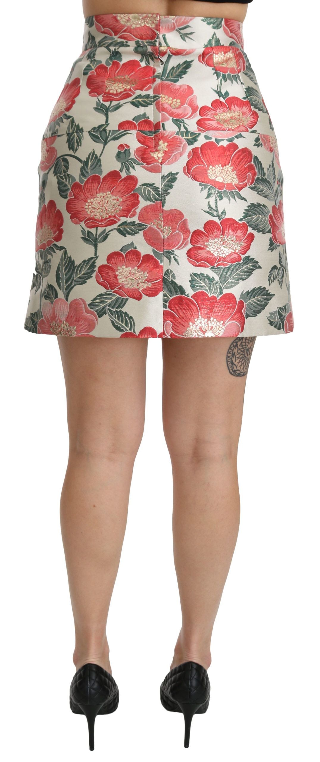 White, green, and red floral high-waist mini skirt by Dolce & Gabbana, featuring a vibrant floral print and a fitted high waist.