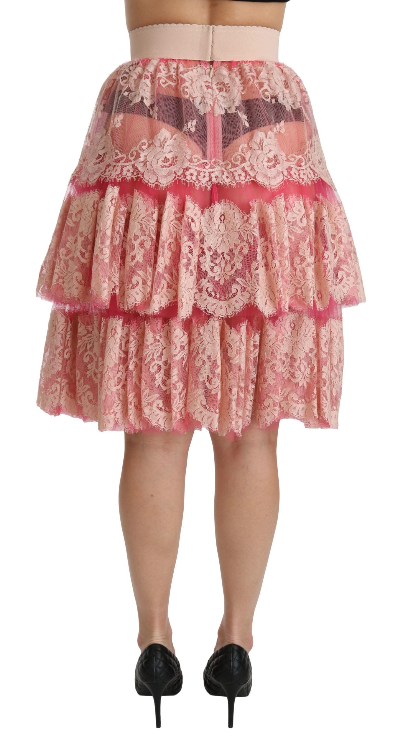 Pink lace layered high waist knee-length skirt by Dolce & Gabbana, featuring elegant lace details and a flowing silhouette.