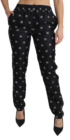 Black printed mid waist skinny silk pants by Dolce & Gabbana, featuring a fitted silhouette and stylish pattern.