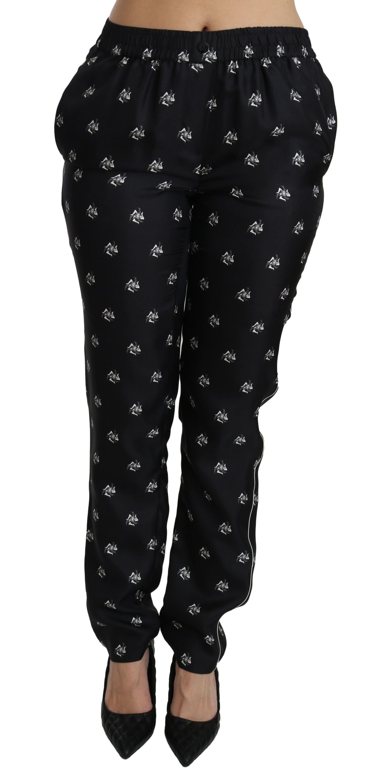 Black printed mid waist skinny silk pants by Dolce & Gabbana, featuring a sleek fit and stylish pattern.