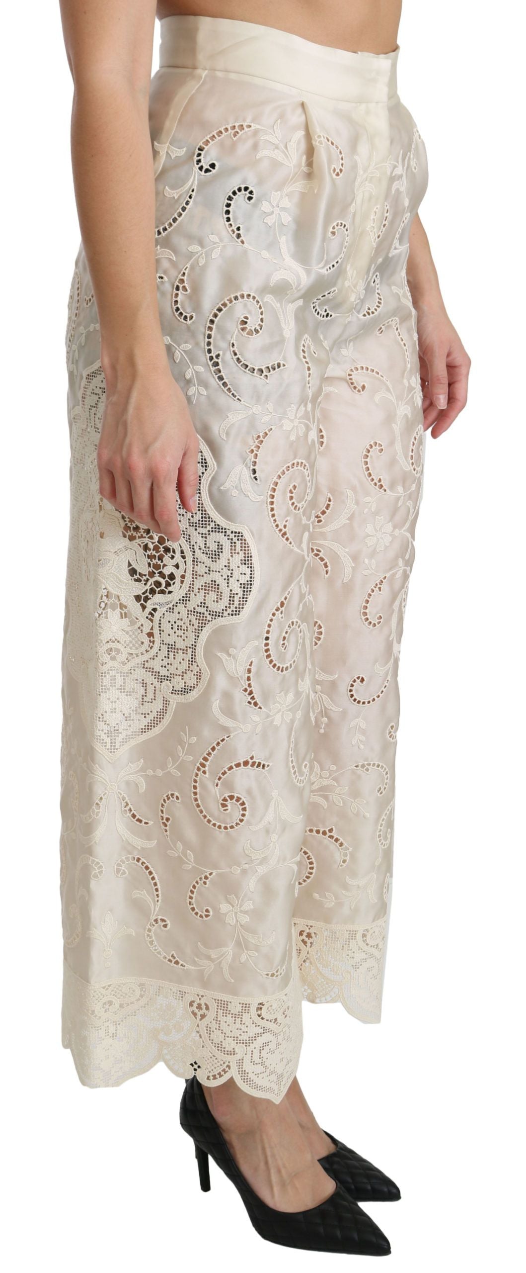 Cream lace high waist palazzo cropped pants by Dolce & Gabbana, featuring intricate lace details and wide-leg silhouette.