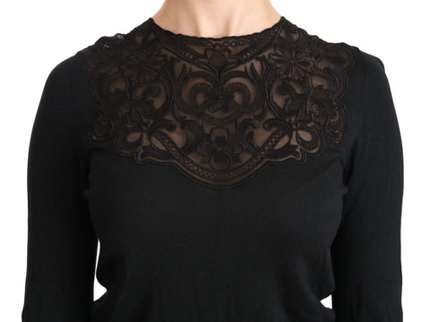 Black silk lace crew neck long sleeve blouse by Dolce & Gabbana, featuring elegant lace details and a classic fit.