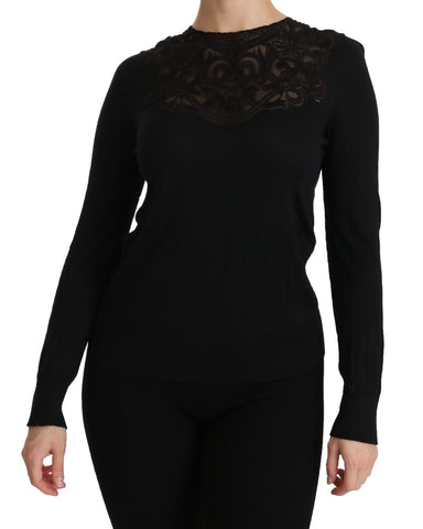Black silk lace crew neck long sleeve blouse by Dolce & Gabbana, featuring delicate lace details and a classic fit.