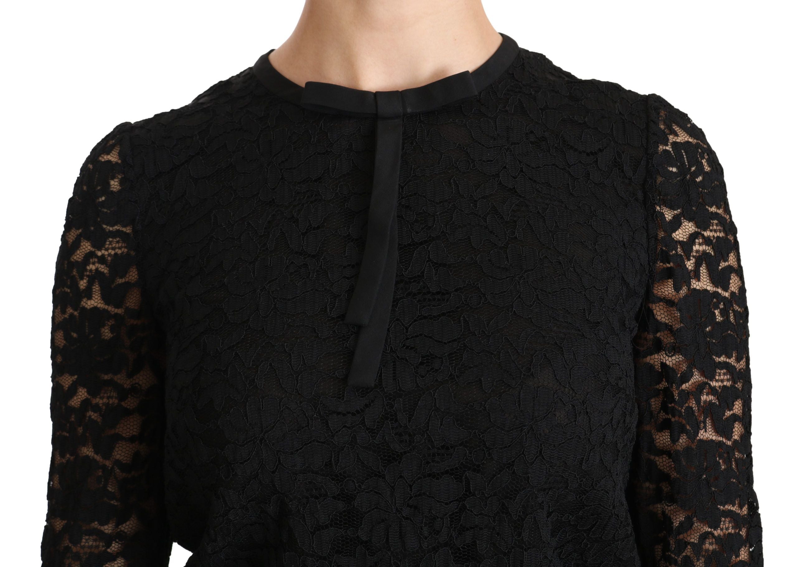 Black lace long sleeve nylon blouse by Dolce & Gabbana, featuring intricate lace details and a fitted design.
