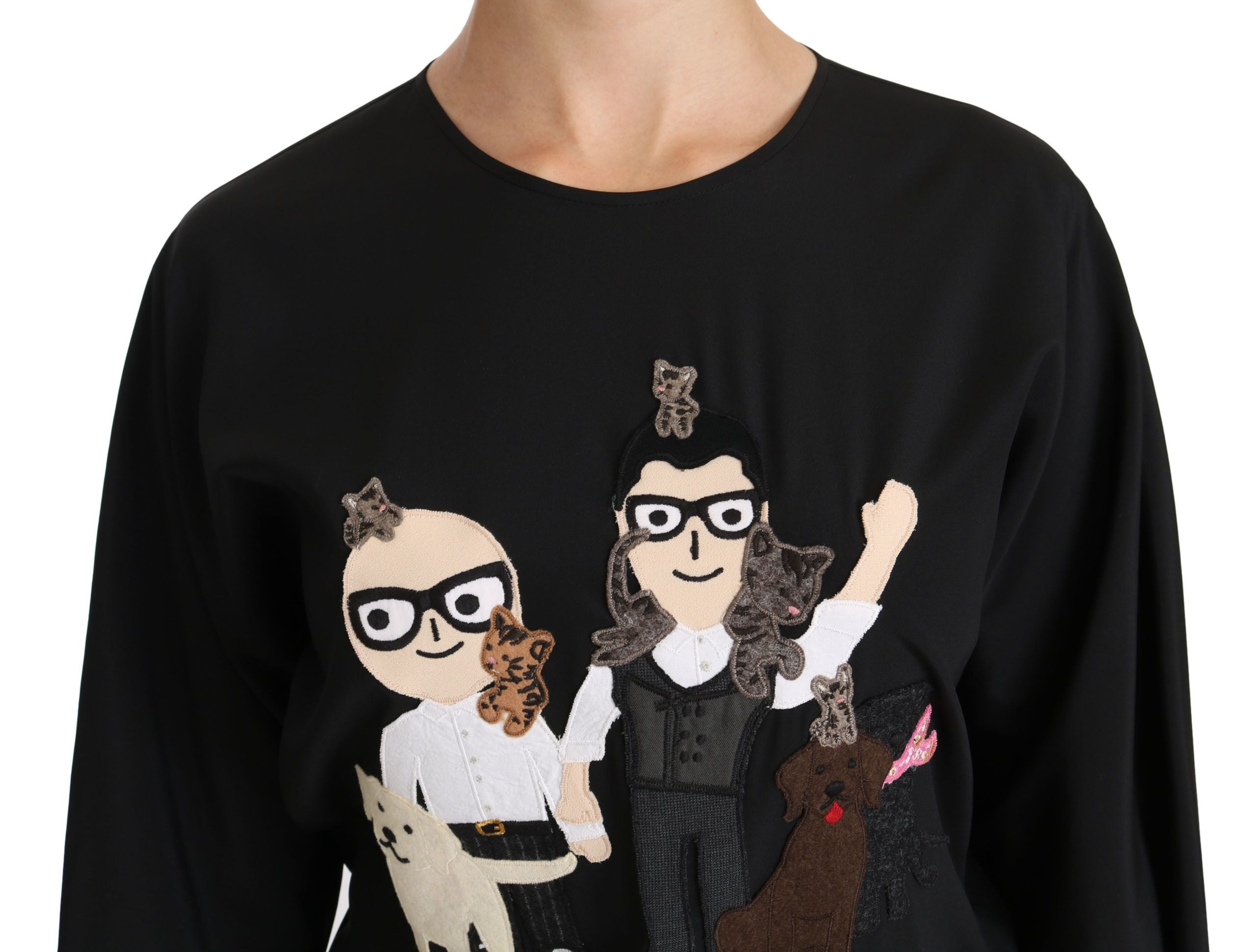Black Dolce & Gabbana silk blouse featuring the #dgfamily Top T-shirt design, shown on a clean, elegant garment display.