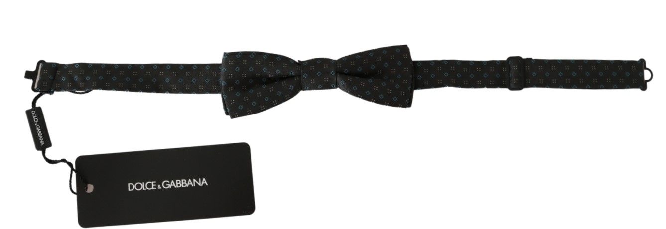 Gray patterned men's silk bow tie by Dolce & Gabbana, featuring a stylish papillon design for formal wear.