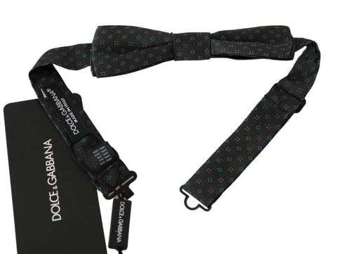 Gray patterned men's silk bow tie with papillon design by Dolce & Gabbana, stylish accessory for formal occasions.