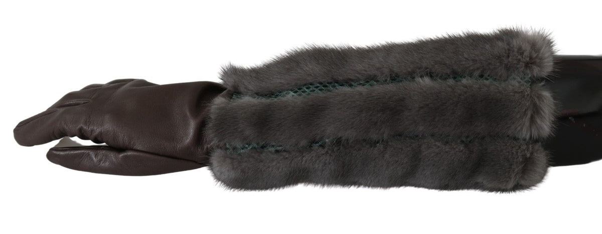 Brown mid-arm length leather gloves with fur trim from Dolce & Gabbana, shown on a mannequin hand.