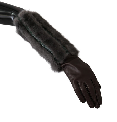 Brown leather mid-arm length gloves with fur trim from Dolce & Gabbana, showcasing the stylish and luxurious design.