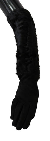 Black suede elbow-length mitten gloves with plush fur trim by Dolce & Gabbana, stylish and cozy winter accessory.