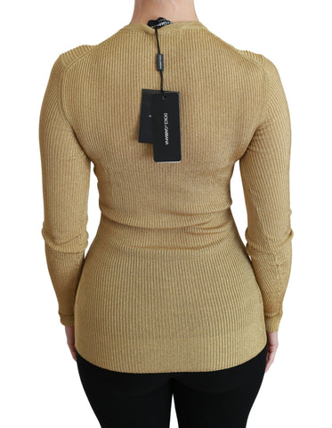 Gold long sleeve viscose cardigan sweater by Dolce & Gabbana, featuring a fitted design and button closure.