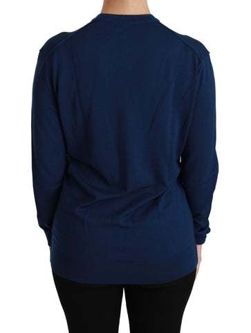 Blue button cardigan made of Virgin wool, Dolce & Gabbana sweater with classic knit design and fitted style.