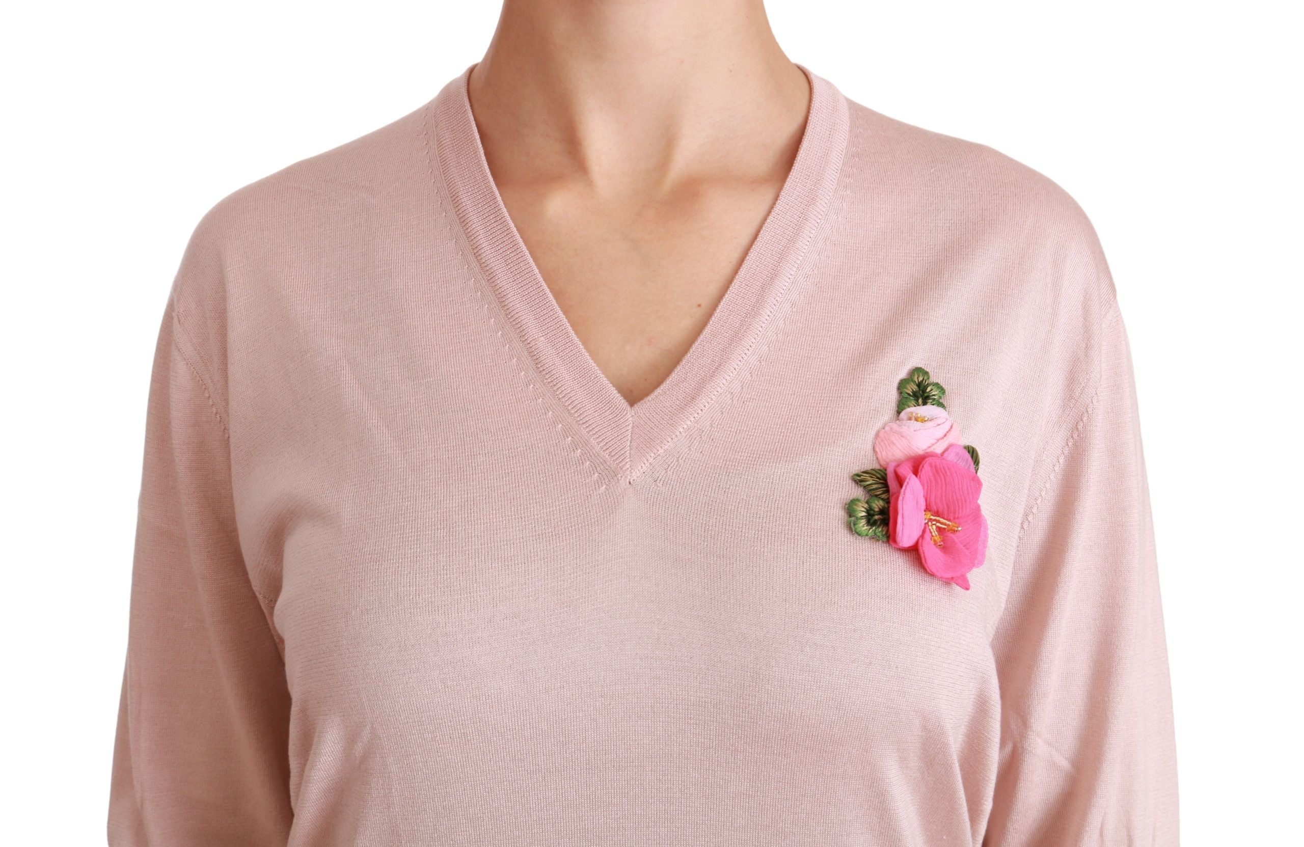 Pink floral embellished silk sweater by Dolce & Gabbana, featuring intricate floral embroidery and a cozy pullover design.