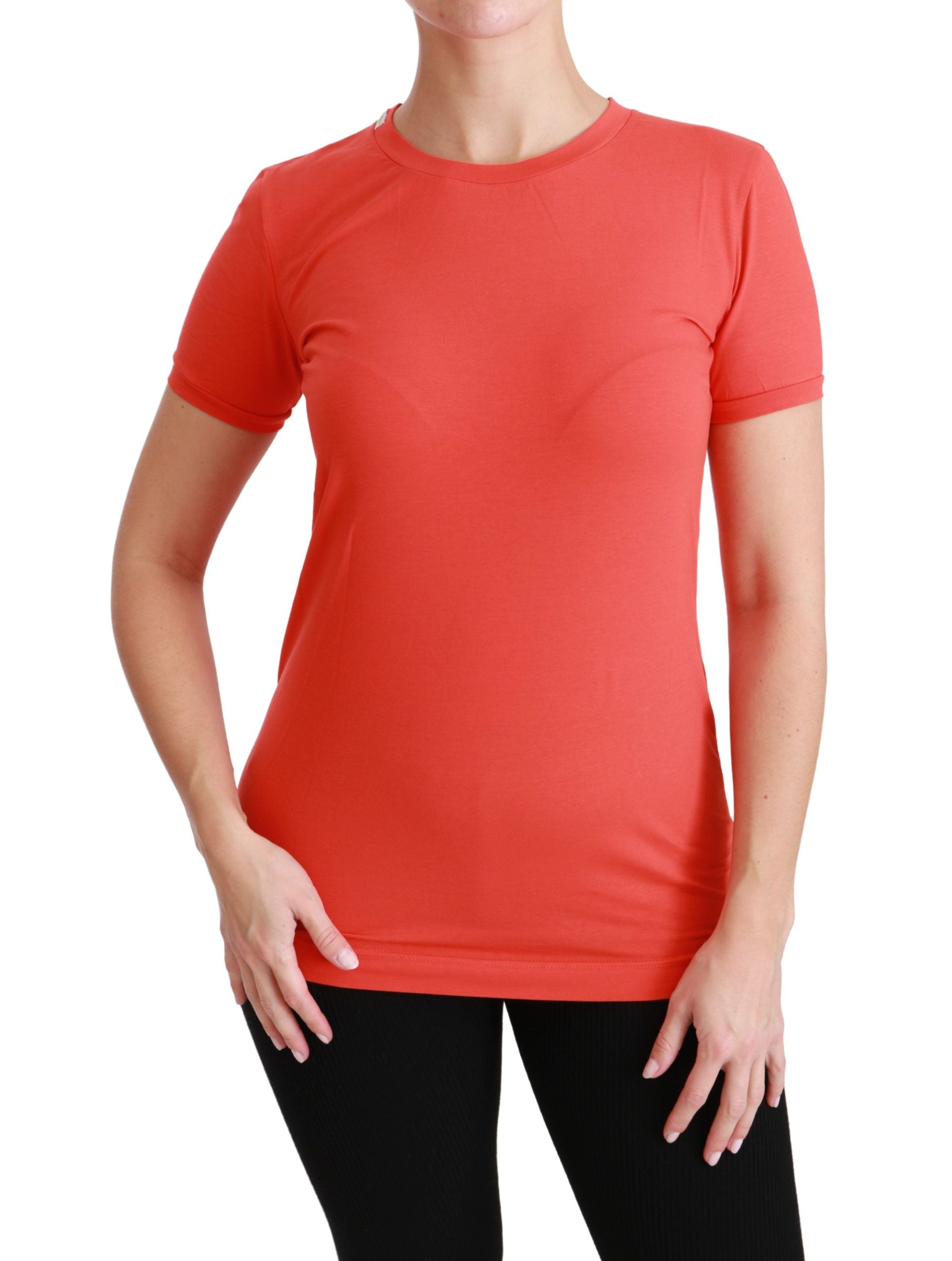 Red cotton crewneck short sleeve T-shirt by Dolce & Gabbana, close-up showing fabric texture and classic fit.