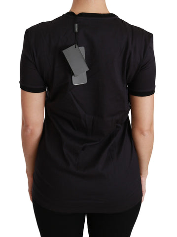 Black Dolce & Gabbana #ImAChristmasTree crewneck T-shirt featuring festive Christmas tree graphic on the front.