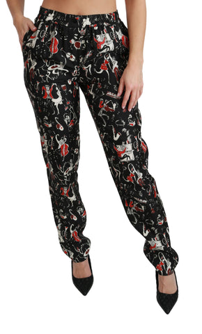 Black silk instrument mid-waist pants by Dolce & Gabbana, featuring a sleek fit and elegant style.