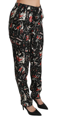 Black silk instrument mid-waist pants by Dolce & Gabbana, featuring a smooth fabric and tailored fit.