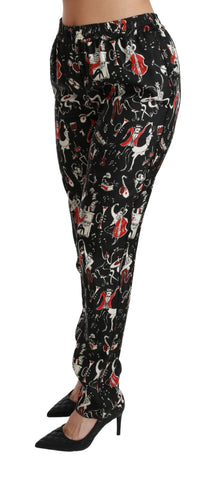 Black silk instrument mid waist pants by Dolce & Gabbana, showcasing sleek fabric and tailored fit for sophisticated style.